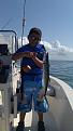 he caught his first spanish mac with his new fishing rod. lol... nice fight
